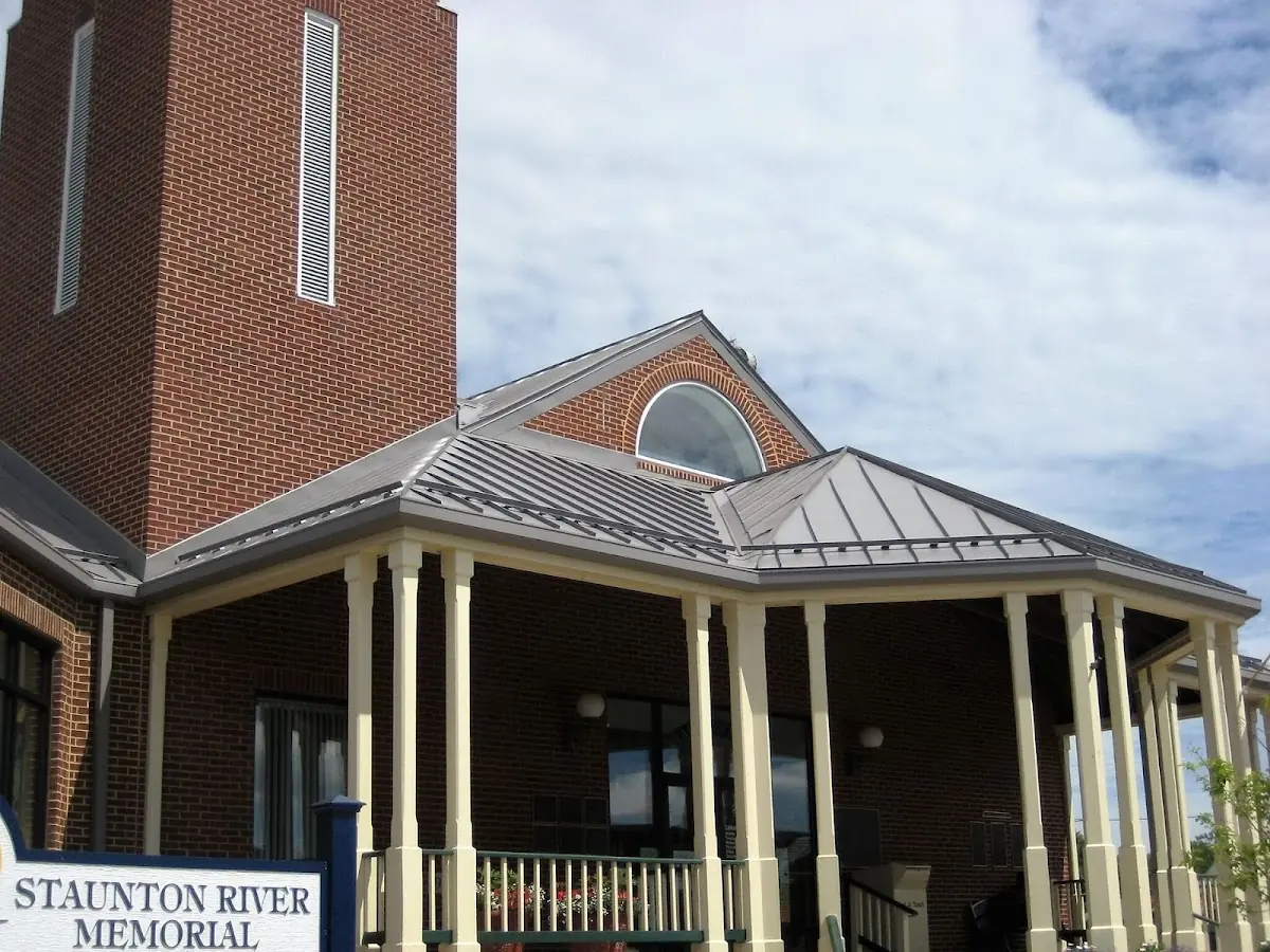 Skilled roofing craftsmen working on a residential roof in Sylvan Hills